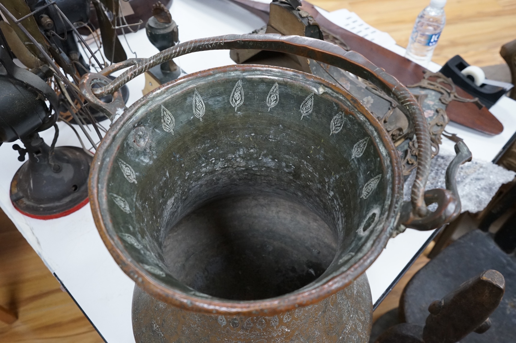 A large Indian copper water pot, 38cm high